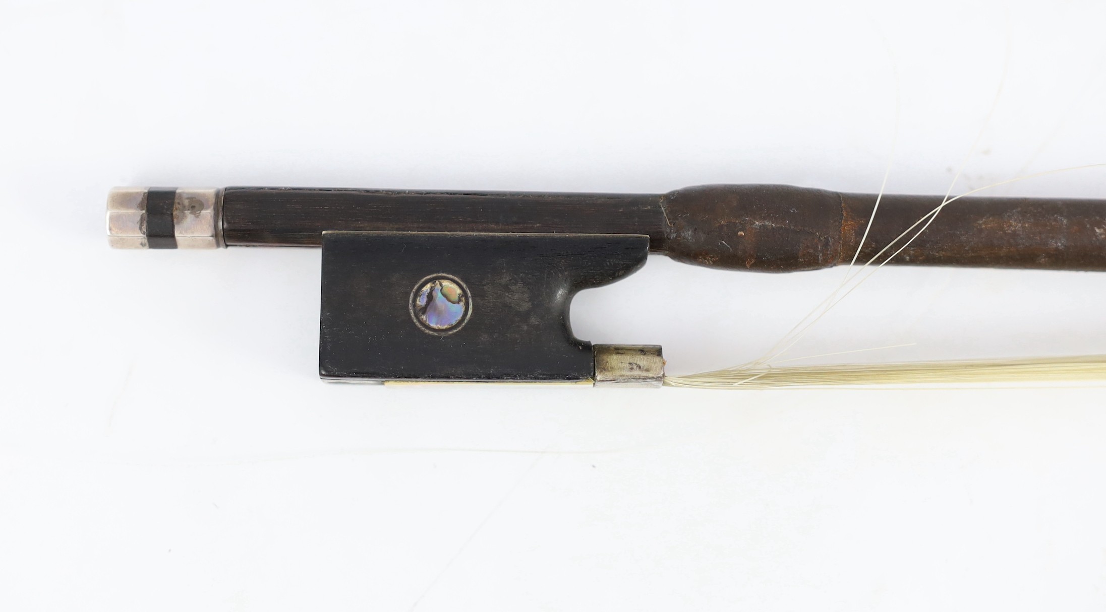A silver mounted violin bow, stamped DODD, another stamped TOURTE and another bow